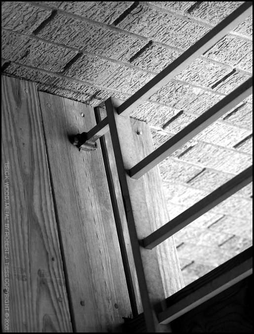 Brick, Wood, Metal - By Robert J. Tiess