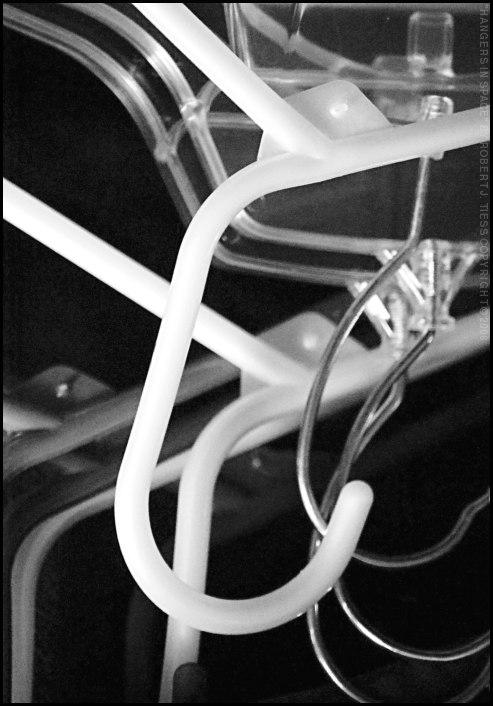 Hangers in Space - By Robert J. Tiess